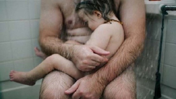 father bathing with son