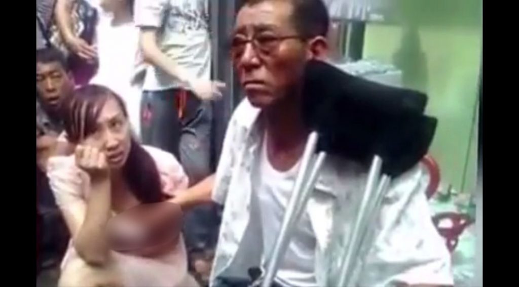 Chinese 'shamen' predicts future by touching woman's breasts