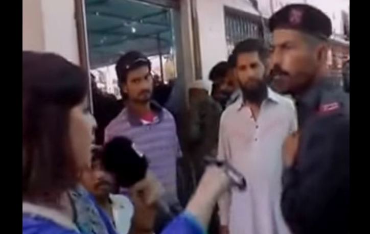 News Anchor slapped by Policeman