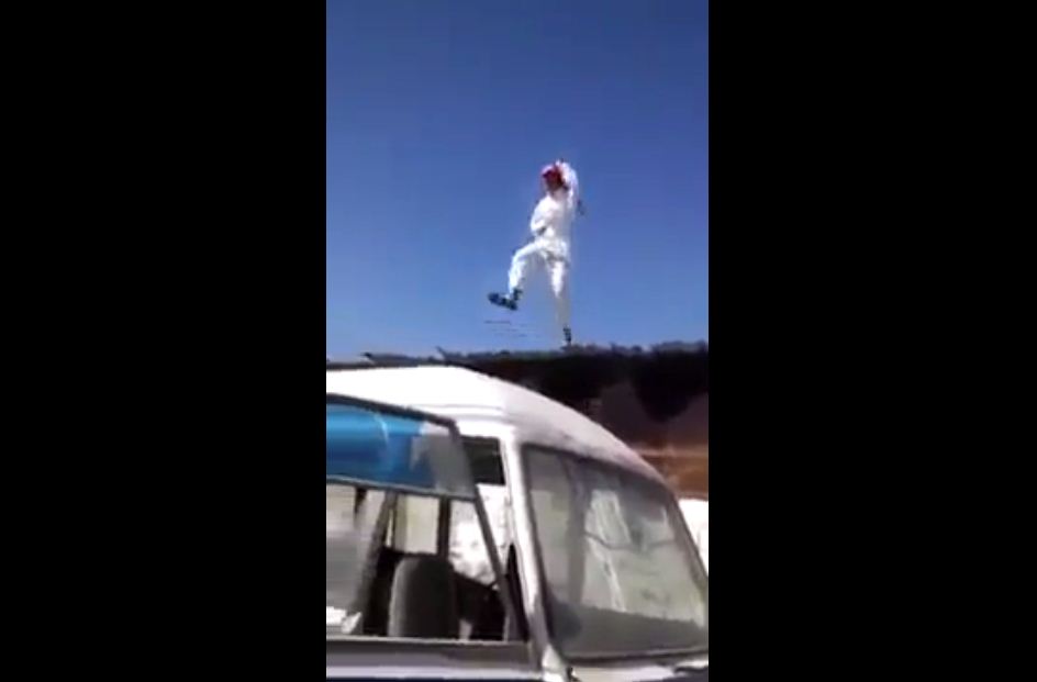 jumps from roof at bus