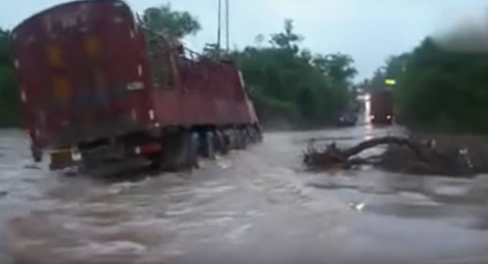 Truck Driver Struck In Flood