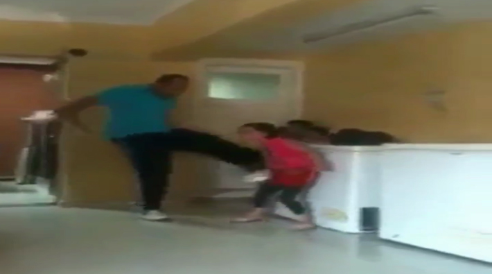 man beating children