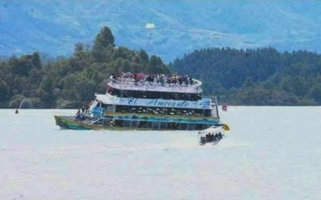boat carrying tourists