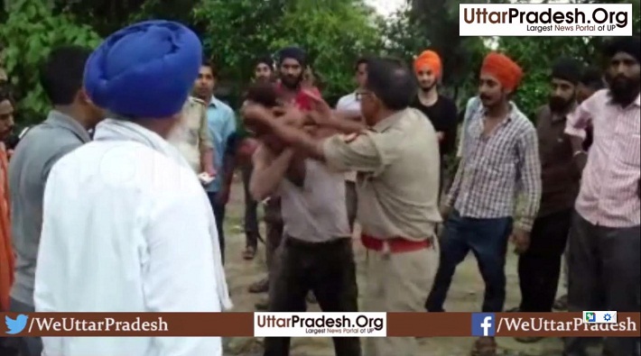 video police beating accused of thevideo police beating accused of theft on road in rampurft on road in rampur