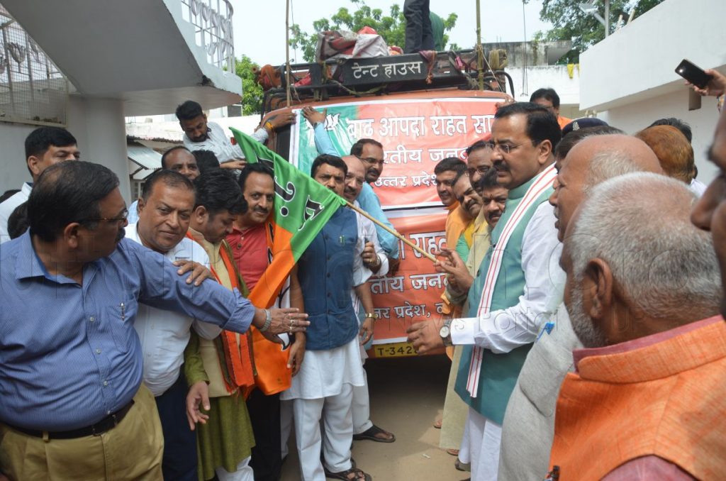 keshav prasad maurya flagged off flood relief vehicle