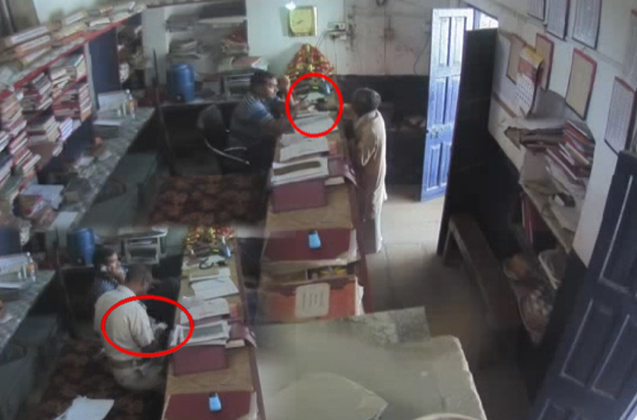 Corrupt Police Officer Caught in cctv taking Bribes