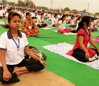 international-yoga-day-taj-people do yoga being fit