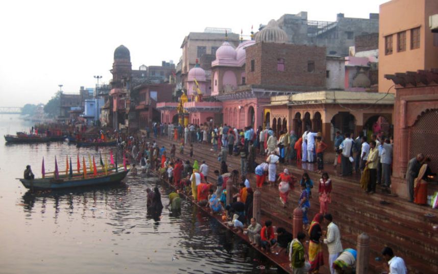 Krishna devotees celebrate bathing in river Yamuna