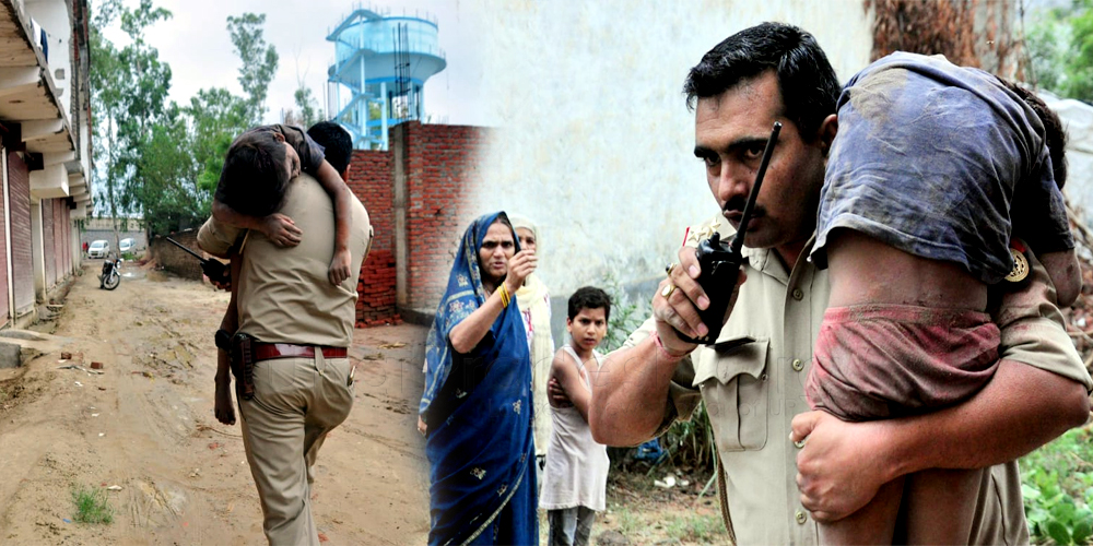 Cop Dharmendra Lamba saved child life Took on shoulder in building collapse