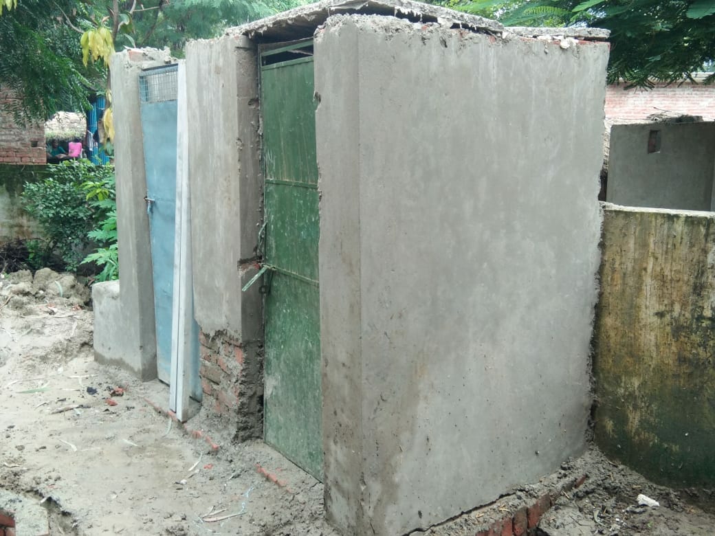 standard less village toilets build, started falling apart in rain