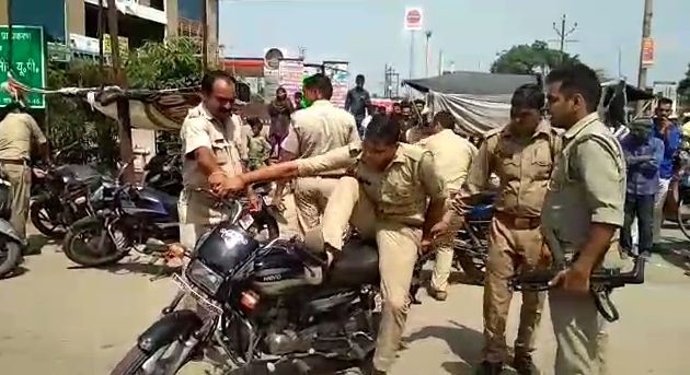firing in BJP program workers flee left motorcycles after police came