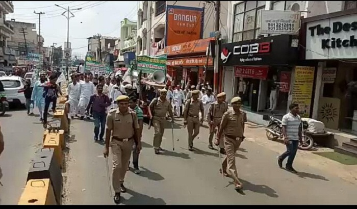 foot march by RLD workers, protest against inflation