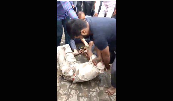 Bijnor: Homeguard beaten of his own strap, video viral