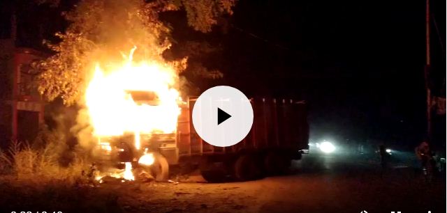 angry crowd burned truck hit three children