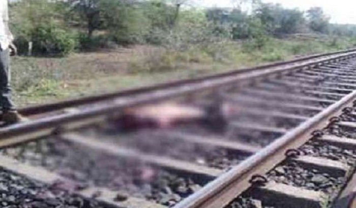 Young boy gets expensive to cross the railway track