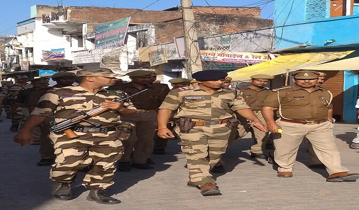 For not impairing the circumstances in Holi police did the Flag March